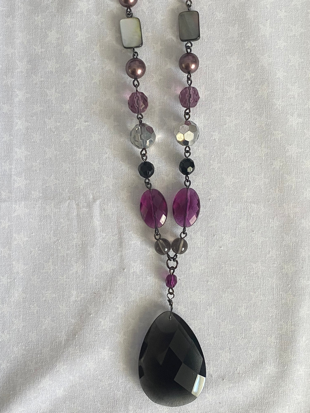 Lia Sophia Hematite Necklace with Abalone, Purple Stones, and Smokey Grey Pendant