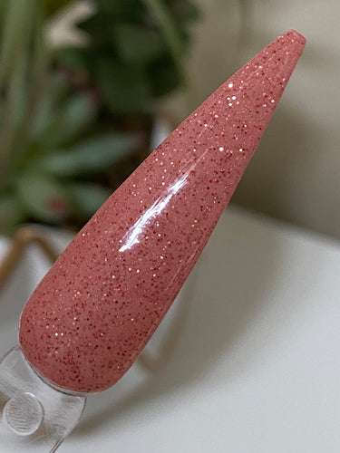 Rosy Cheeks is a blush pink semi sheer base with added fine rose gold metallic glitter.