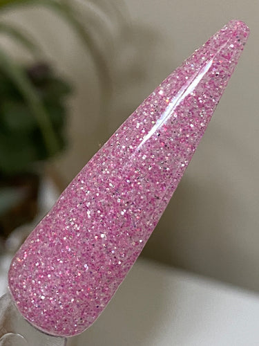 Faith is a mix of fine iridescent and metallic pink glitters.